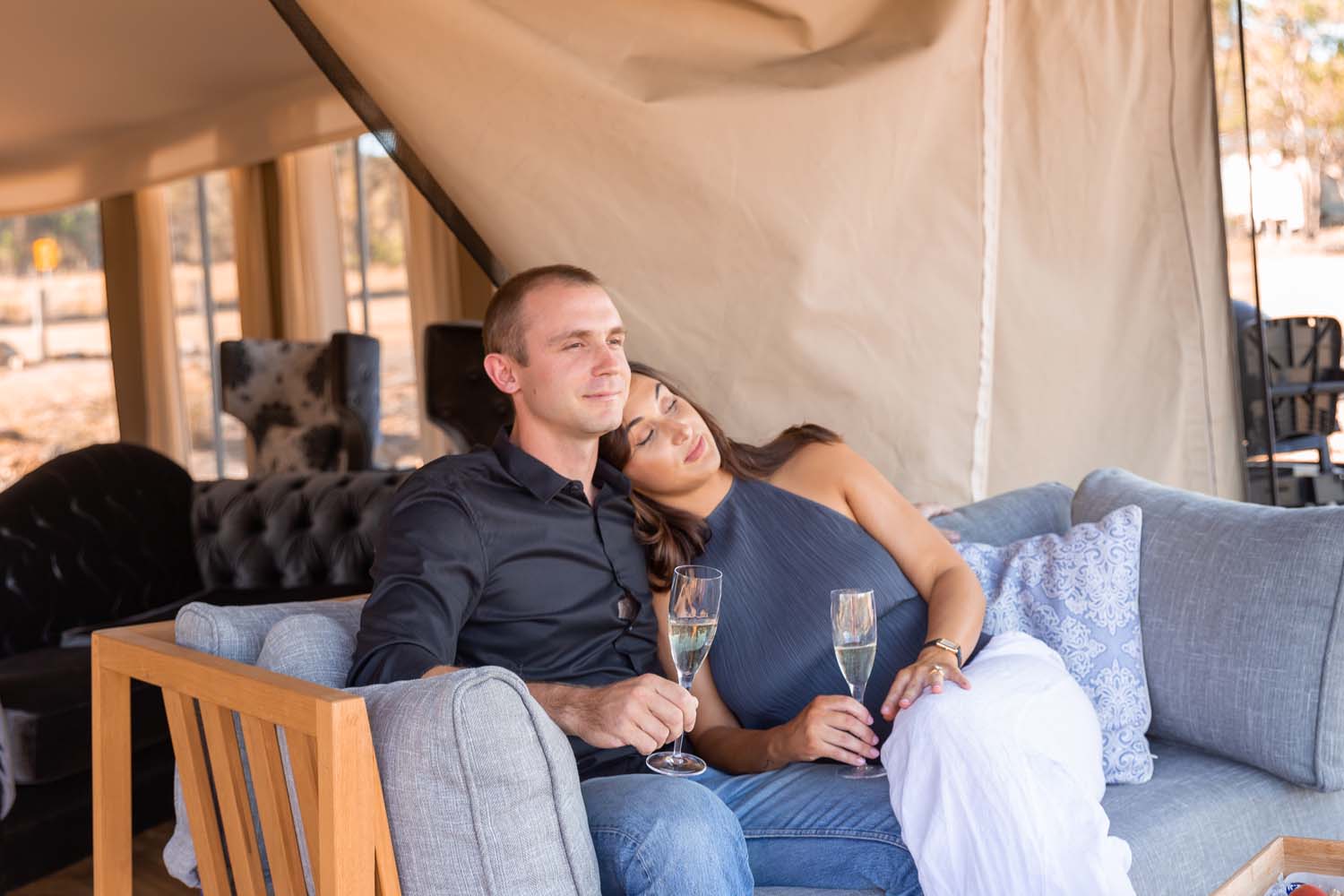 Serenita Stanthorpe Servern Glamping Tent outside on the lounge with wine