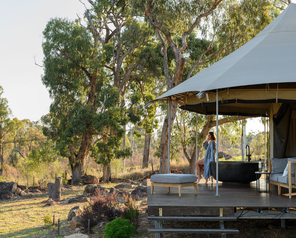 Luxury adults only glamping in Stanthorpe on the Severn River. Private tents with outdoor baths, king beds and river views. Romantic Granite Belt escape.