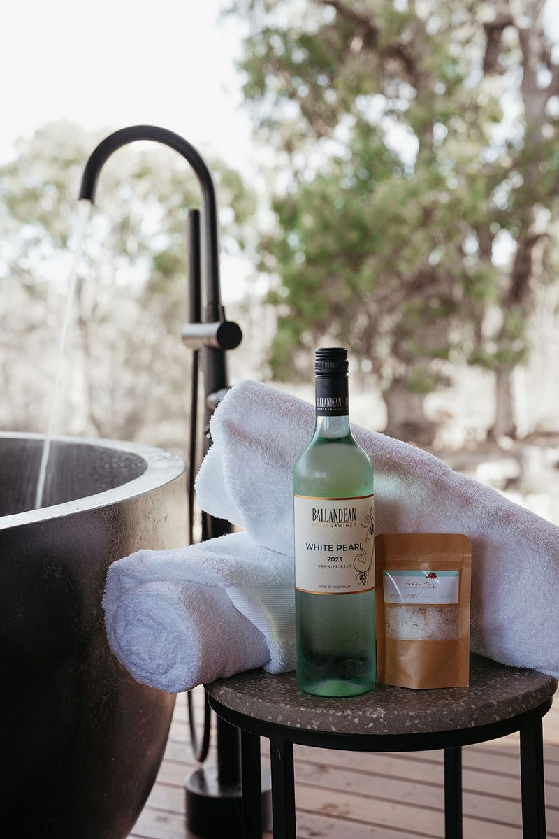Book your luxury glamping stay at Serenità Stanthorpe. Romantic couples accommodation with river views, outdoor baths and premium inclusions.